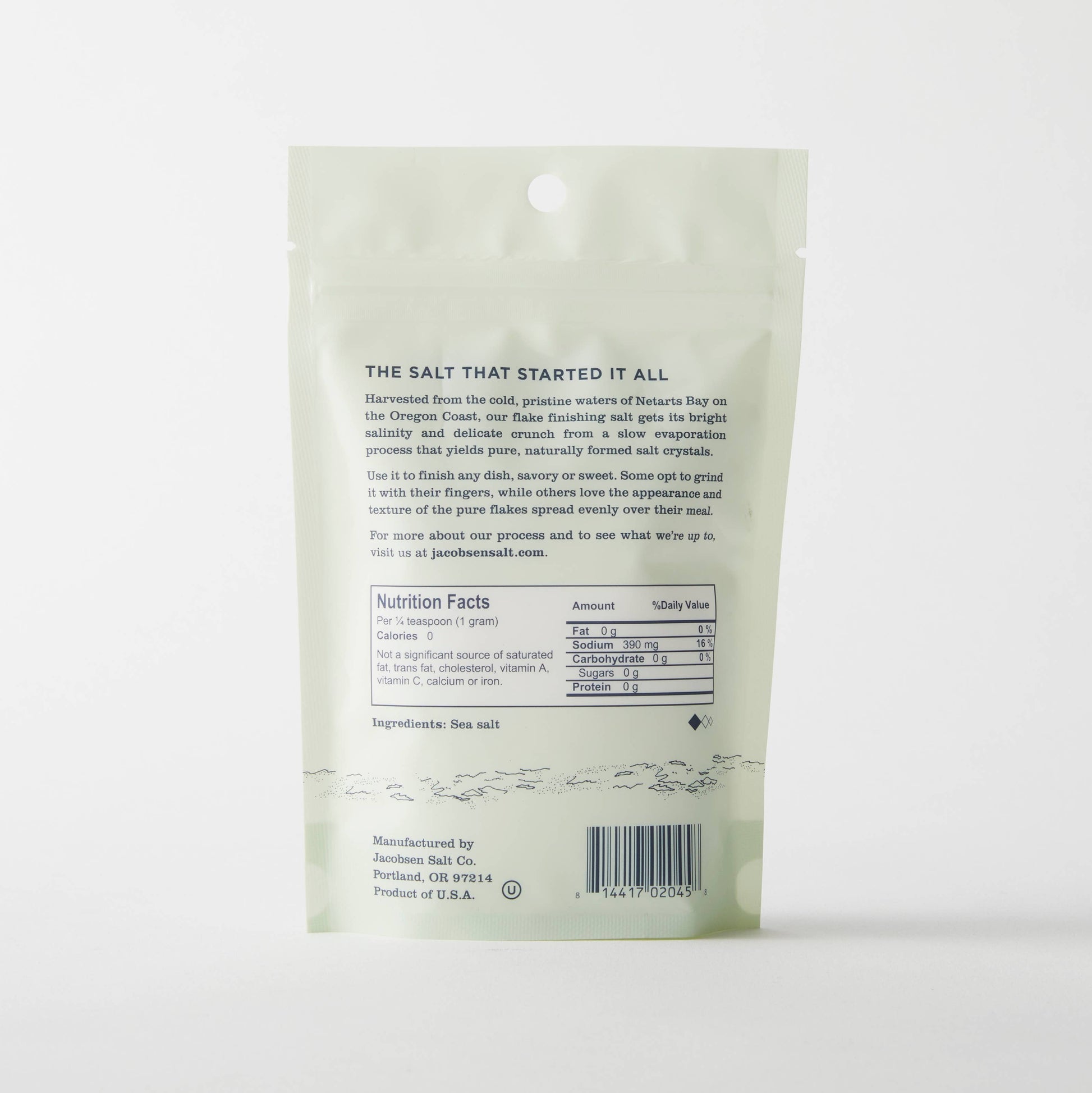 Back of a salt packaging with text and nutrition facts on a white background