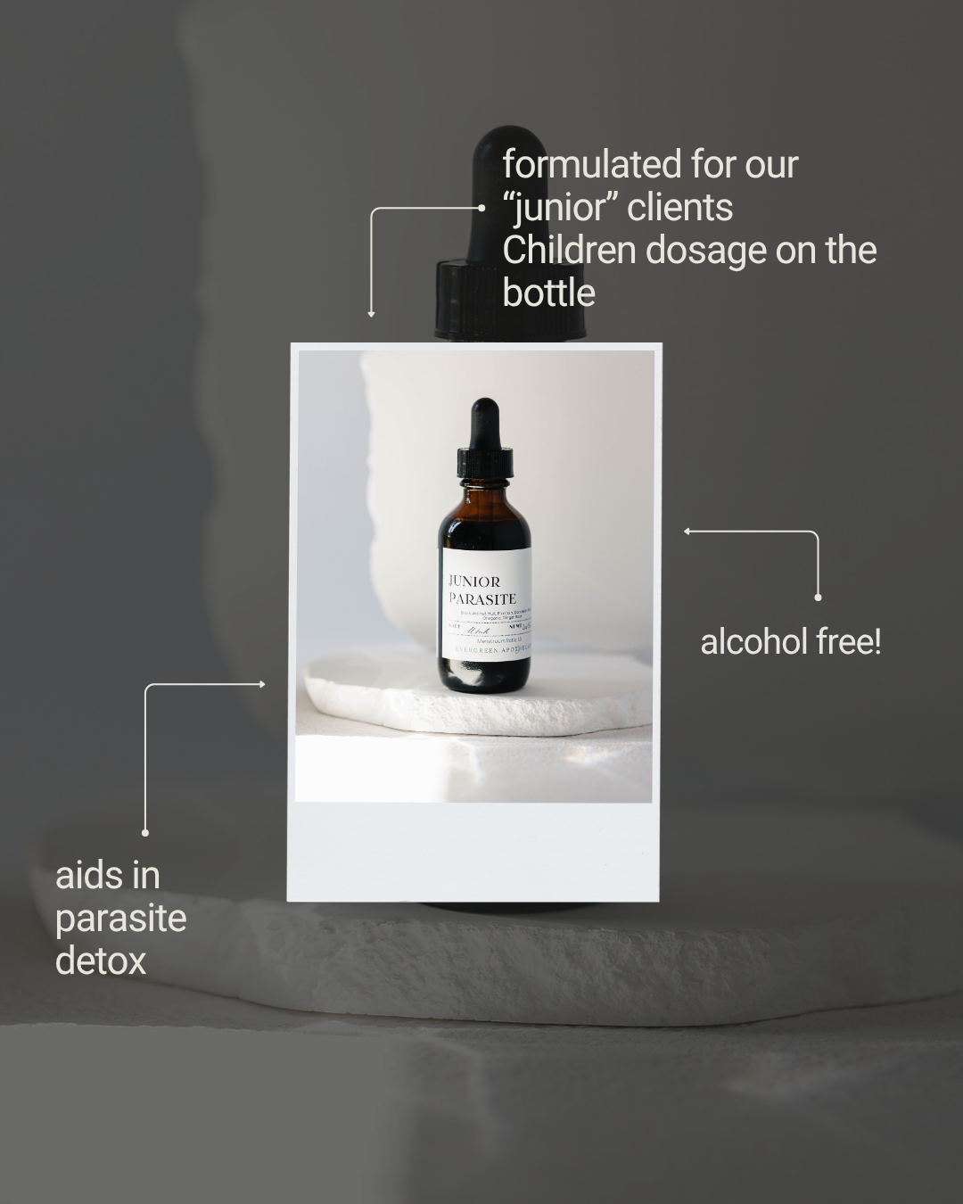 Bottle of 'Junior' product with text highlighting features on a dark background
